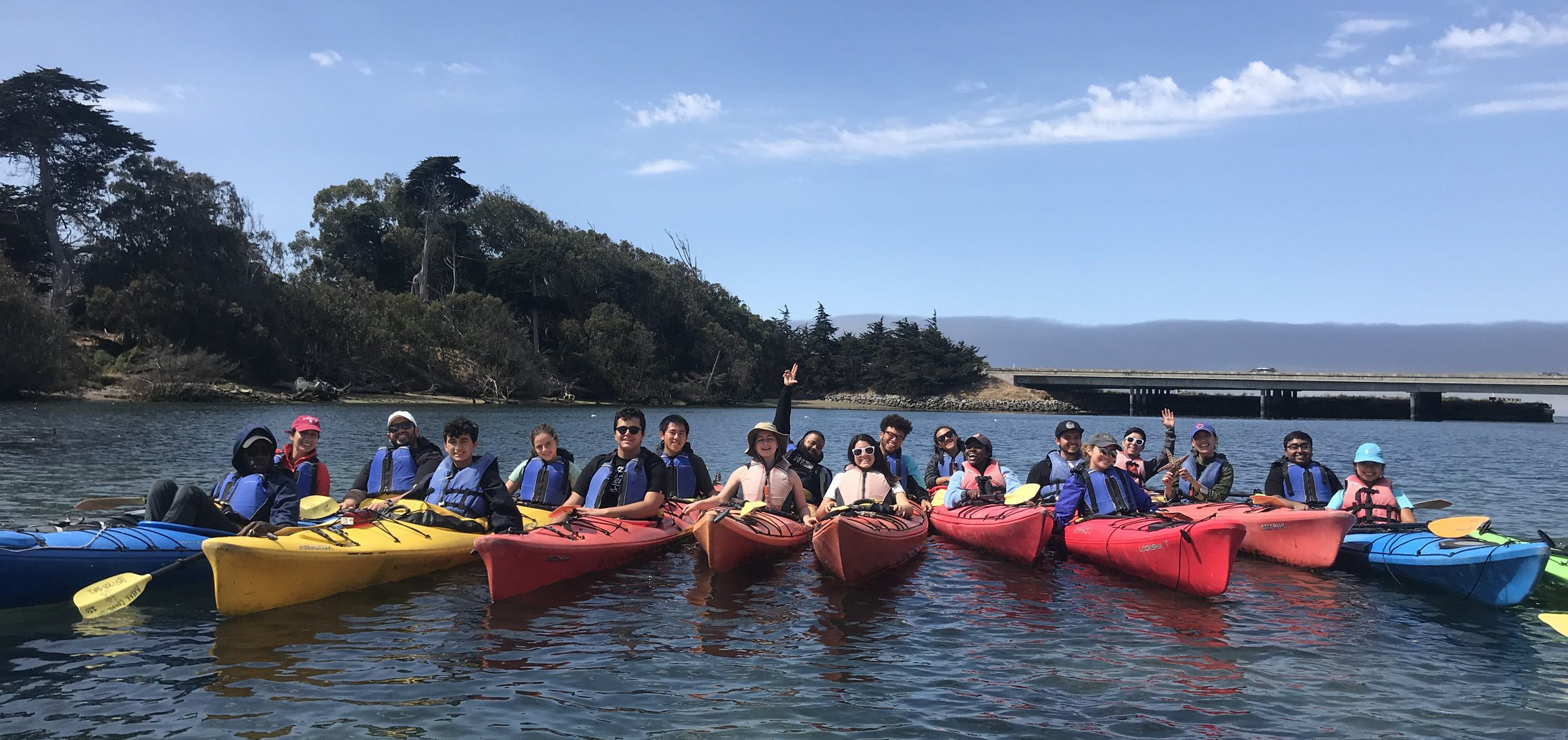 SURGE group photo of students in kayaks
