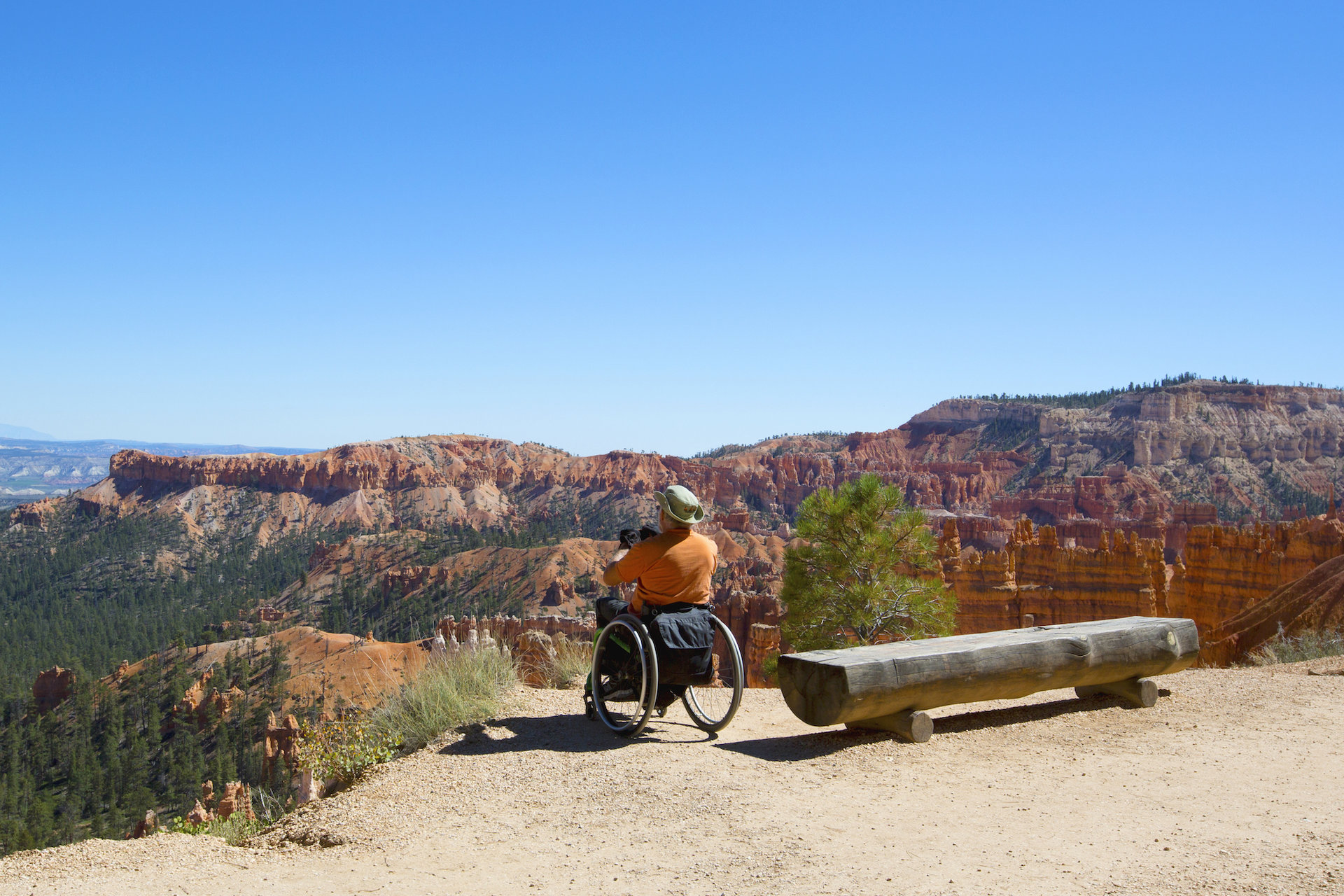 A man using a wheelchair overlooks Bryce Canyon