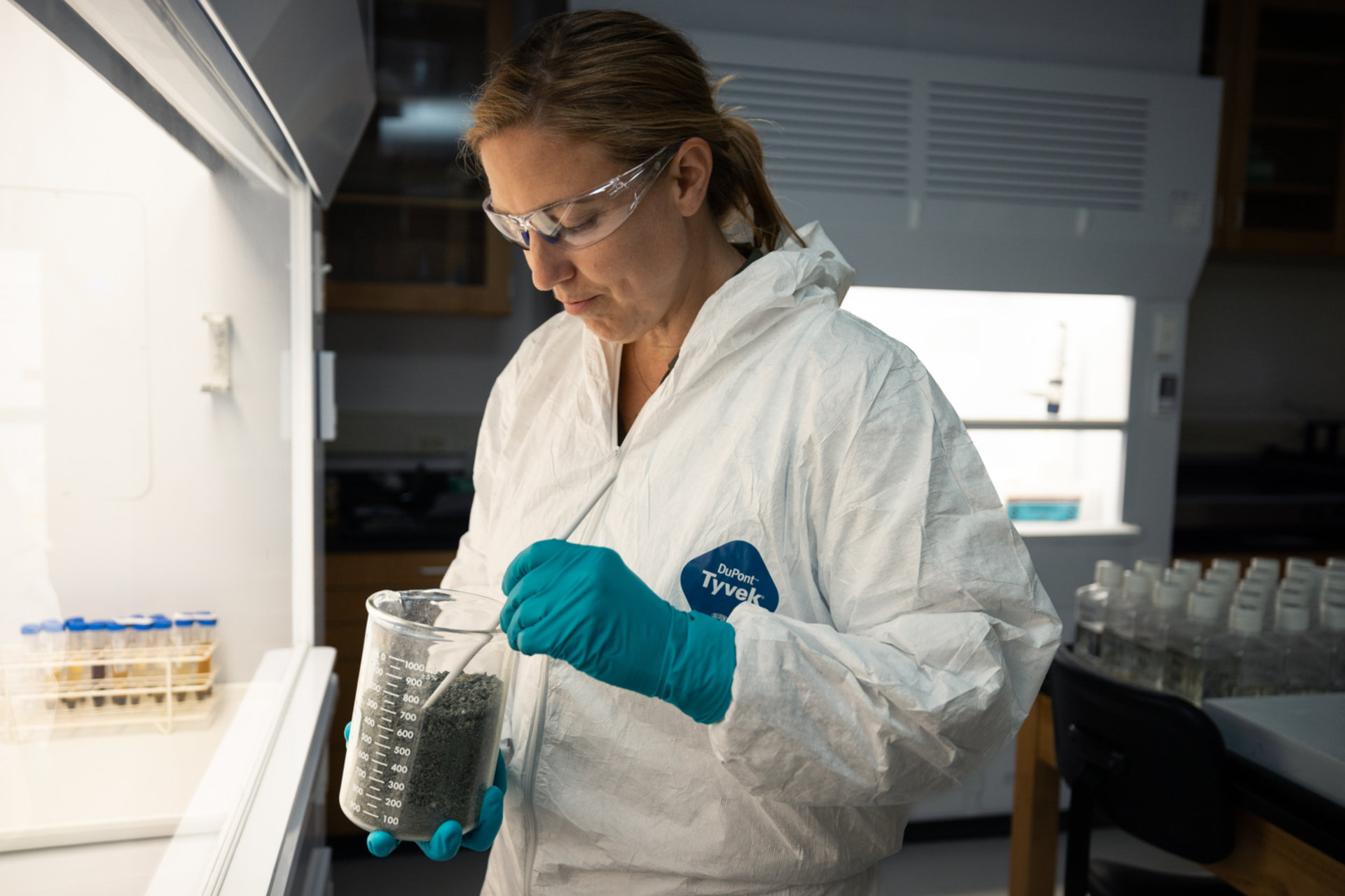 Jane Willenbring holding sample in the lab